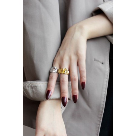 WHITE GOLD/ 18K GOLD PLEATED RING s'inspire de l'anatomie humaine